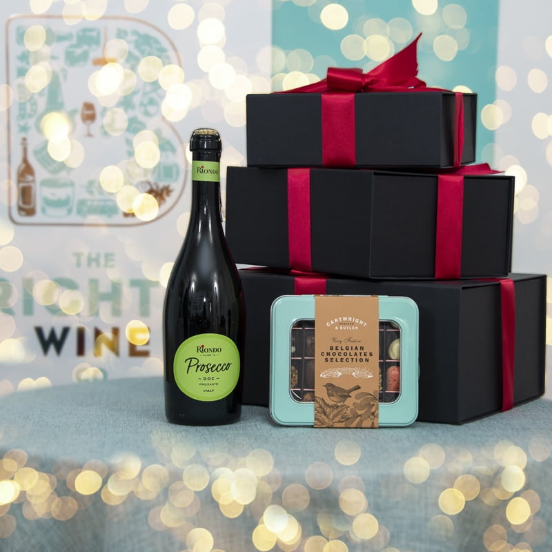 Creative Product Photography of wine bottle with festive bokeh lighting by Nick Ford Photography