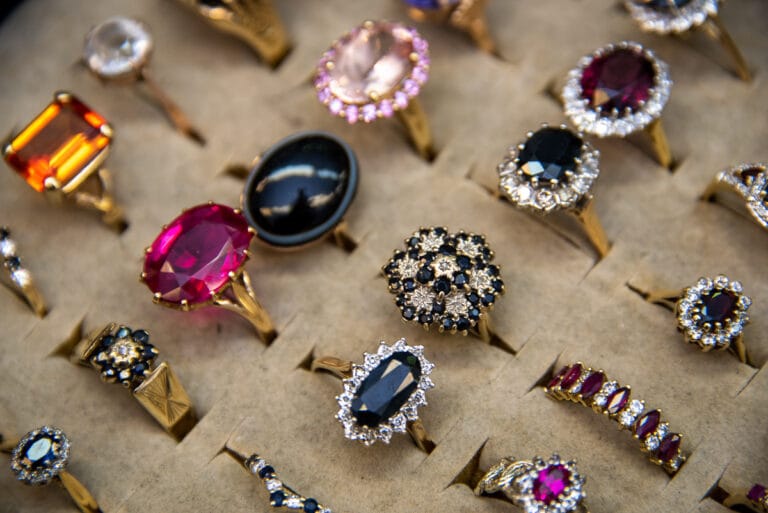 A series of different rings, all have a different stone and style. Some are more colourful ,pinks and oranges.the others darker with deep blues,blacks and purple.