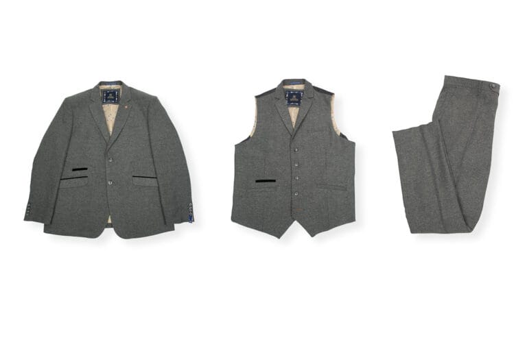 Suit jacket, waistcoat, and trousers displayed neatly next to each other on a white background, showcasing a coordinated and polished ensemble with a sharp, tailored fit.
