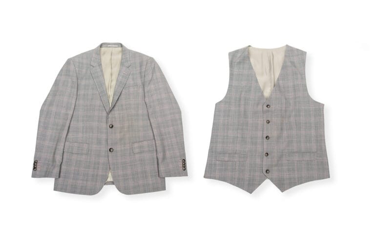 Two-piece suit displayed on a simple white background, showcasing its clean lines and tailored fit, perfect for a sharp and sophisticated look.