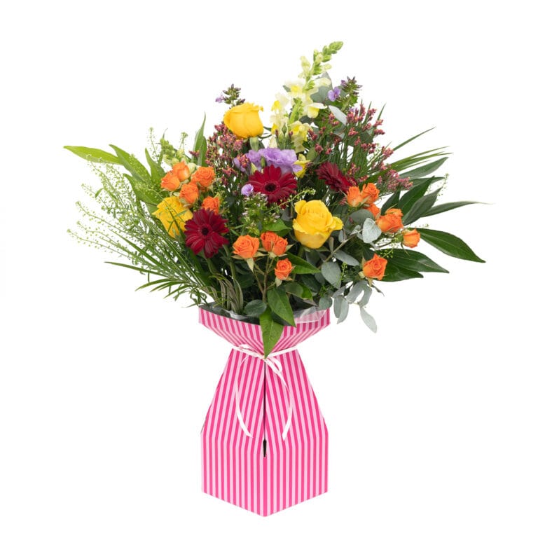 Bouquet in a pink striped cardboard vase, set against a simple white background, showcasing the vibrant flowers and unique, modern packaging.