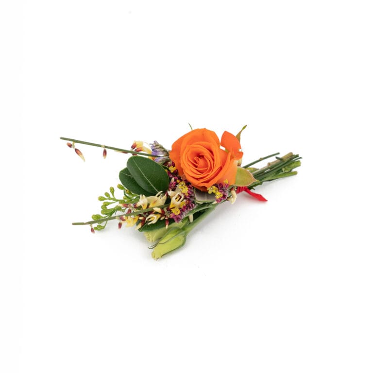 Buttonhole flowers displayed on a simple white background, highlighting their delicate design and elegant details.