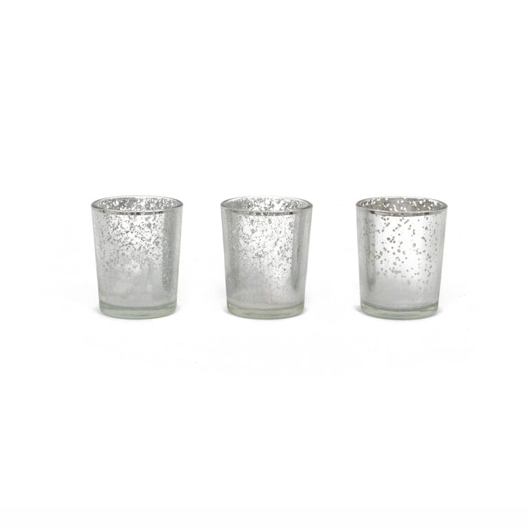 Silver-speckled tealight candle holders on a simple white background, highlighting their elegant design and shimmering details.